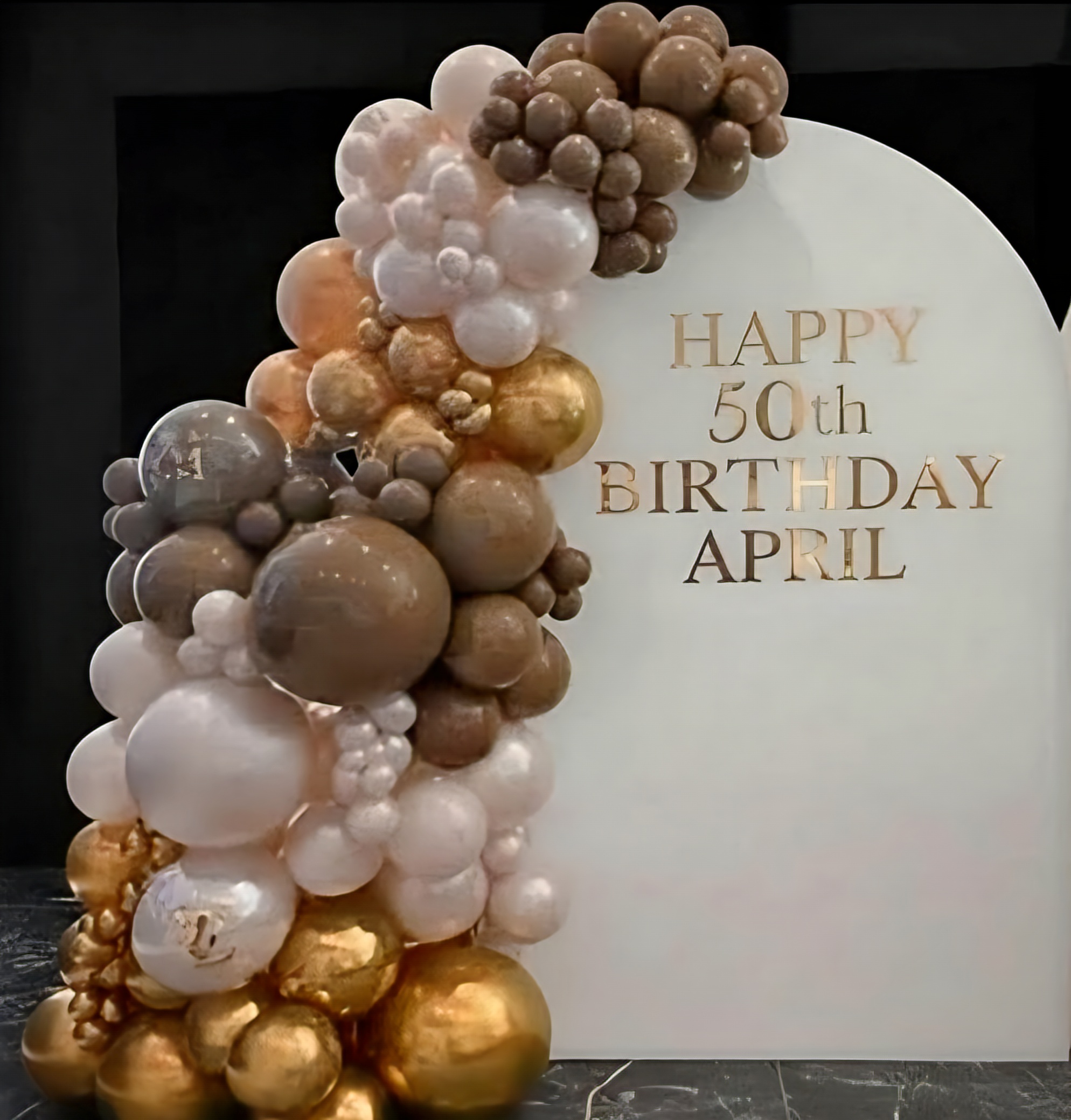 Champagne, blush, and gold birthday balloon arrangement