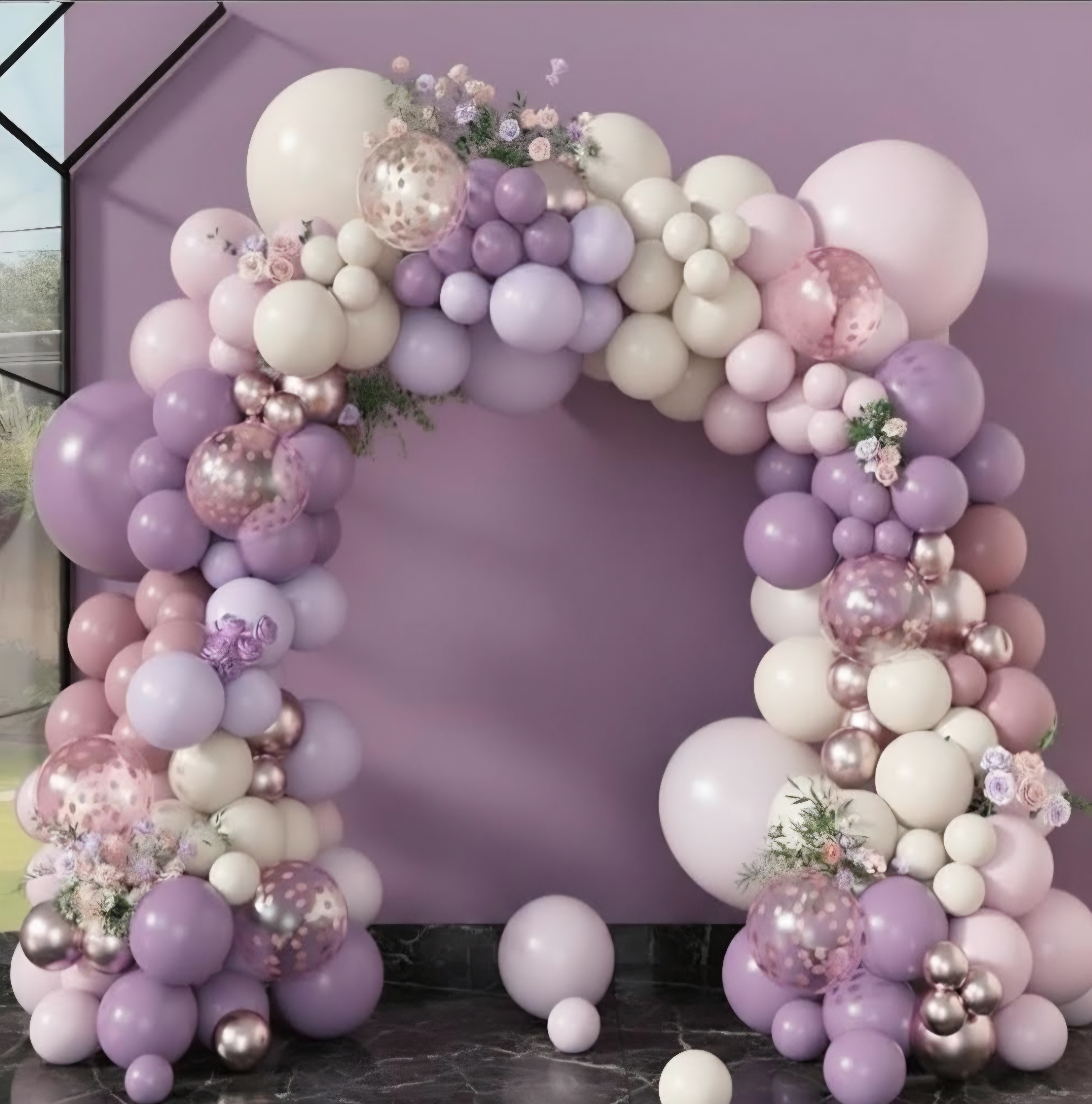 Lilac, blush, and cream balloon garland framing a portrait area
